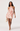 Woman wearing a floral dress on a white background
