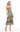 Woman wearing a strapless floral dress on a white background