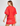 Woman wearing a red outfit with floral embroidery on a white background
