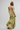 Woman wearing a floral dress with a white background