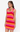 Woman wearing a colorful striped dress on a white background
