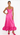 A woman modeling a bright pink satin maxi dress with a ruffled hem and thin straps, paired with matching pink heels, against a plain white background.