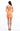 Woman wearing a strapless orange dress on a white background