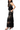 Black lace dress worn by a model on a white background