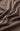Close-up of a brown button-up shirt with visible stitching details.
