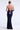 Navy sequin evening gown with a backless design on a white background