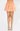 ADELYN RAE SOLEIL YARN DYED PLAID FLARED MINI SKIRT IN ORANGE AND WHITE