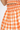 ADELYN RAE SOLEIL YARN DYED PLAID FLARED MINI SKIRT IN ORANGE AND WHITE