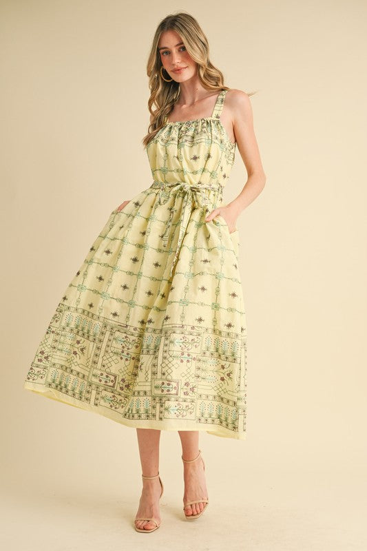ELISE SMOCKED MIDI DRESS IN LEMON DROP