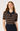 A woman wearing a brown and beige horizontally striped short-sleeve polo shirt with a dark navy collar, paired with navy trousers, against a plain light gray background.