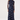A woman modeling a navy blue long-sleeve midi dress with a sheer mesh overlay and a blue and white floral pattern, paired with black strappy heels against a plain white studio background.