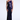 Woman wearing a one-shoulder purple sequin gown on a white background