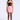A model wearing a strapless mini dress with a dark brown sequined bodice and a light pink skirt, paired with sheer black tights and black high heels, against a light gray studio background.