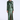 A woman modeling a floor-length metallic green gown with long sleeves, a round neckline, a draped wrap-style skirt detail, and a high front slit, photographed against a clean light gray studio background.