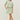 Woman wearing a green and white striped outfit on a white background