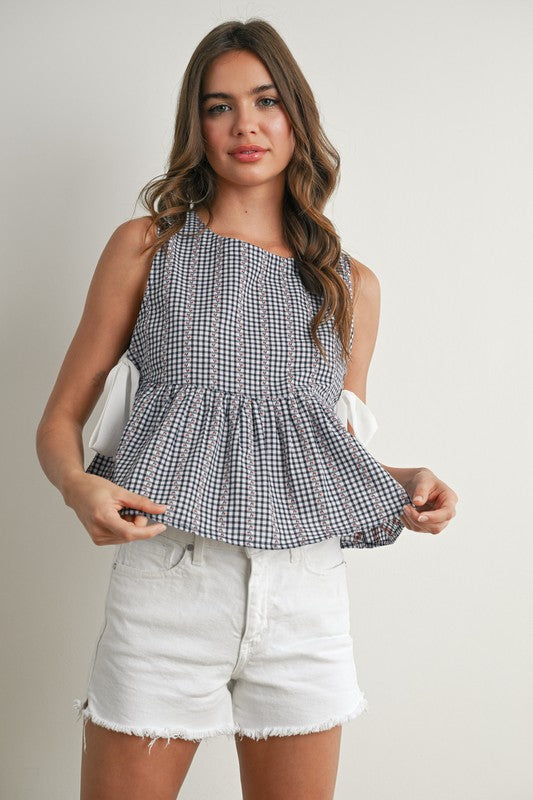 SKY MEADOW PEPLUM TOP IN NAVY AND IVORY