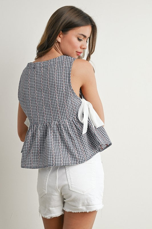 SKY MEADOW PEPLUM TOP IN NAVY AND IVORY