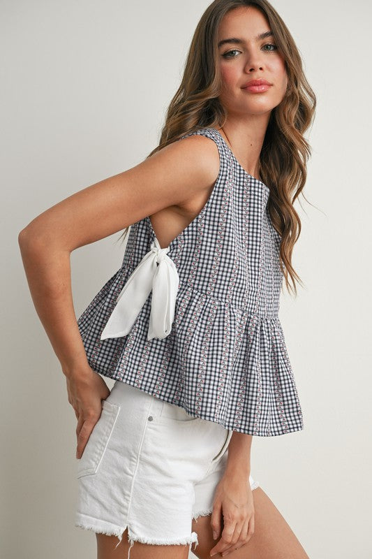 SKY MEADOW PEPLUM TOP IN NAVY AND IVORY