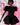 Model wearing a black textured dress with puff sleeves against a colorful abstract background