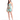 Woman wearing a floral strapless dress on a white background