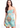 Woman wearing a strapless floral dress on a white background