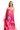 Woman wearing a strapless pink floral dress on a white background