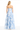 Woman wearing a strapless floral dress on a white background