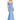 Woman wearing a strapless blue evening gown on a white background