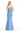 Woman wearing a strapless denim dress on a white background