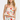 Woman wearing a floral dress with red accents on a white background
