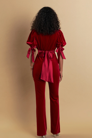 ENDLESS ROSE BOW TIE VELVET JUMPSUIT IN ROUGE