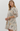 FLORAL PLEATED ROUND NECK MINI DRESS IN ECUR