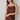 Woman wearing a satin cami in rum raisin