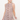 WOMAN WEARING A GINGHAM BUTTON FRONT DRESS IN MOCHA.