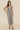 WIRED STRAPLESS MIDI DRESS IN IVORY BLACK