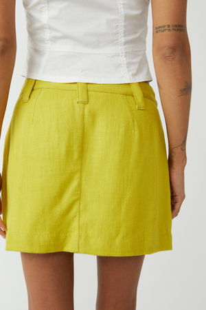 FREE PEOPLE CANT BLAME ME MINI SKIRT IN CITRONELLE