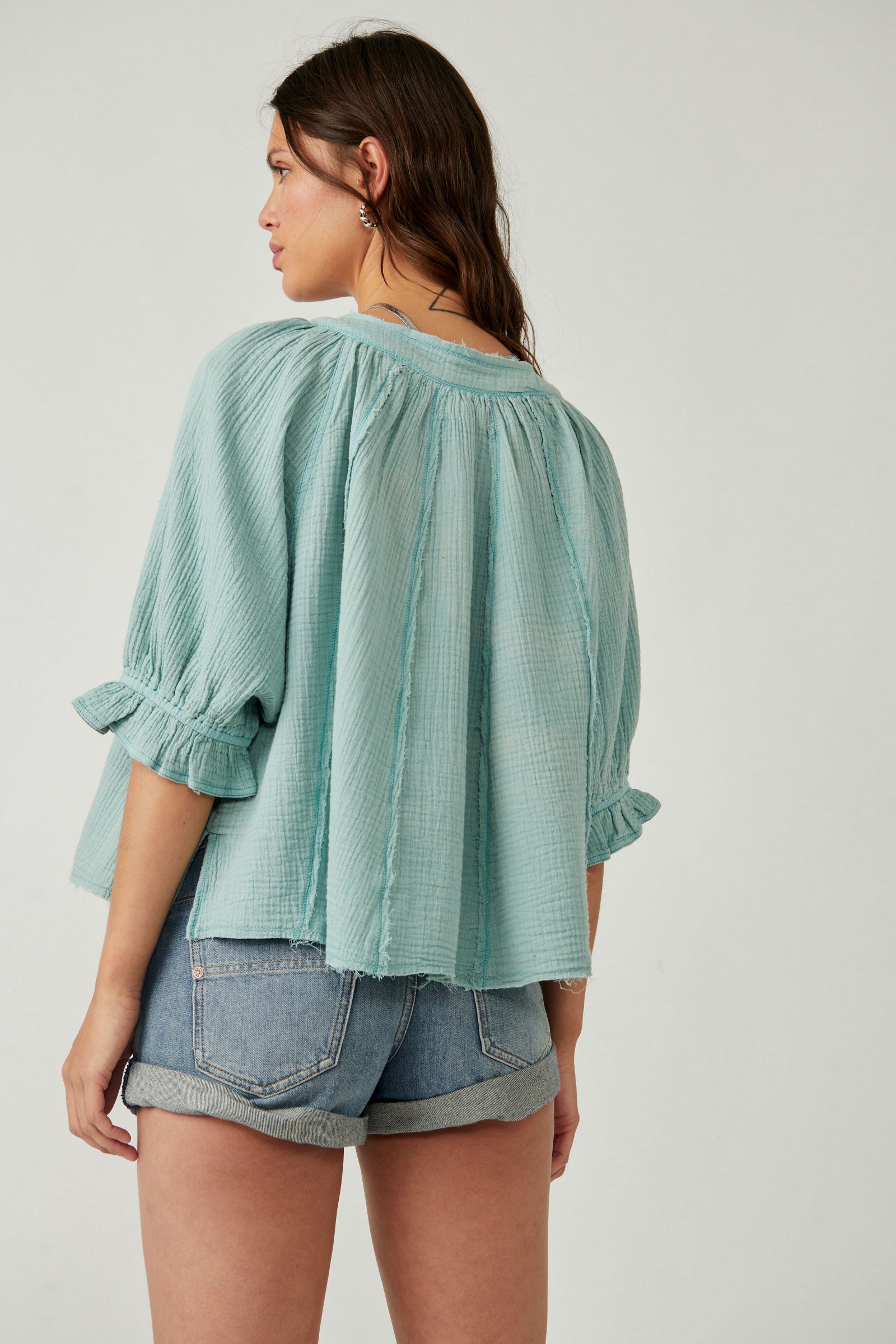 FREE PEOPLE LUCY SOLD SWING TOP IN BLUE SURF