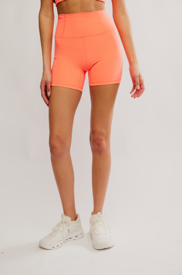 FREE PEOPLE NEVER BETTER BIKE SHORT IN NEON CORAL