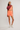 FREE PEOPLE NEVER BETTER BIKE SHORT IN NEON CORAL