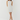 Woman wearing a white lace dress on a white background
