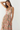 Woman wearing a floral dress on a white background