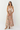 Woman wearing a floral dress on a white background
