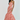 Woman wearing a red and white striped dress on a white background