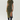 A woman modeling a short-sleeve olive green midi dress with a black floral pattern and a thigh-high slit, paired with black over-the-knee boots, against a plain light gray studio background.