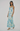 Woman wearing a floral dress on a white background