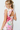 FLORAL PRINT BOW BACK MINI DRESS IN PINK