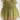 A close-up of a person wearing a light olive green smocked mini skirt with a subtle pink floral pattern, paired with a matching ruffled top.