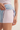 Pastel-colored shorts with a light background