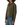 A woman wearing an olive green utility jacket with brown contrast collar, cuffs, and pocket trim, paired with blue jeans, shown against a plain white background.