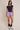 WAIST TIE CHECK SHORTS IN PURPLE